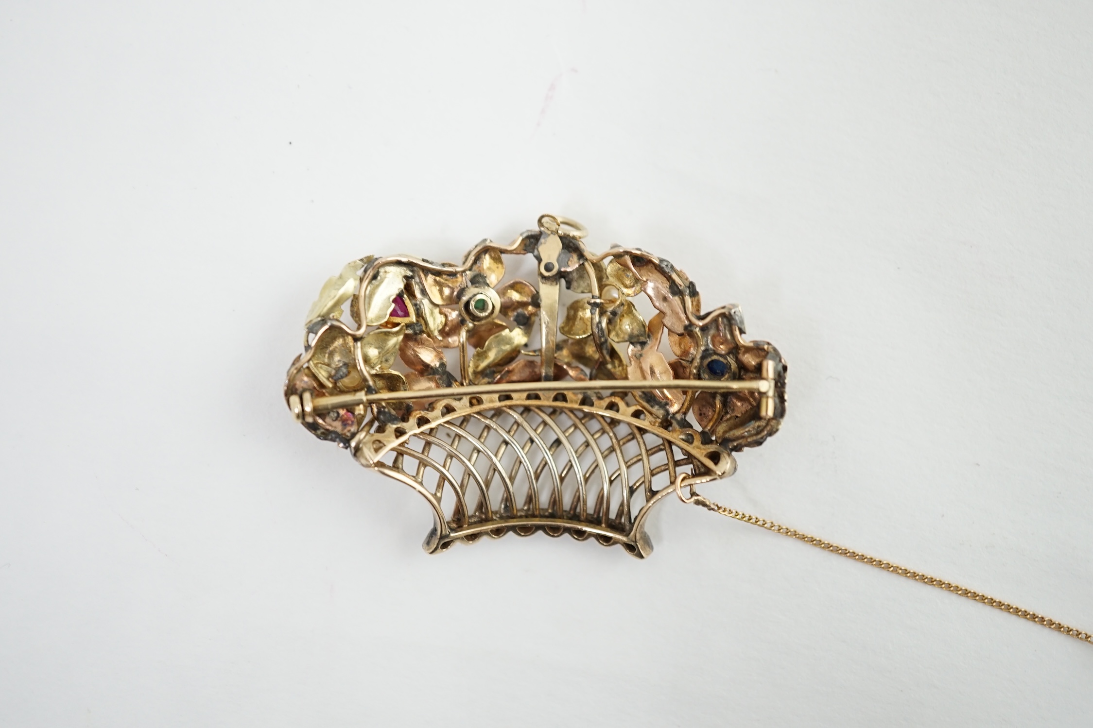 A late 19th century Continental two colour gold, silver, diamond, sapphire, ruby, emerald and pearl set giardinetto pendant brooch